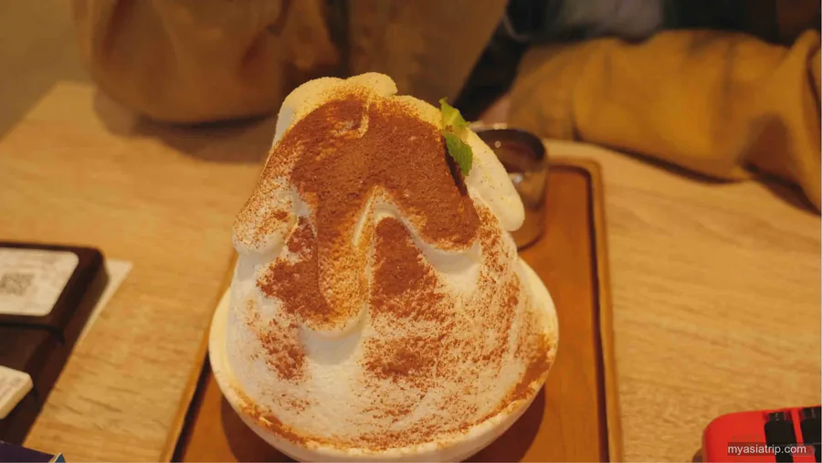 Thai shaved-ice dessert topped with toasted meringue in Bangkok