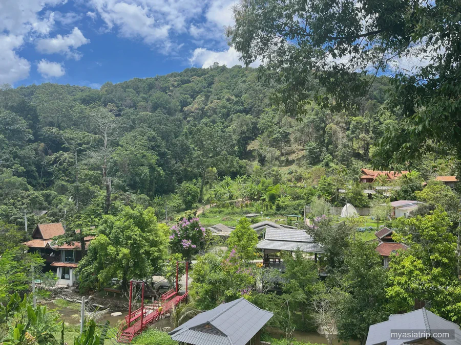 Hills and village landscape on a northern Thailand road journey