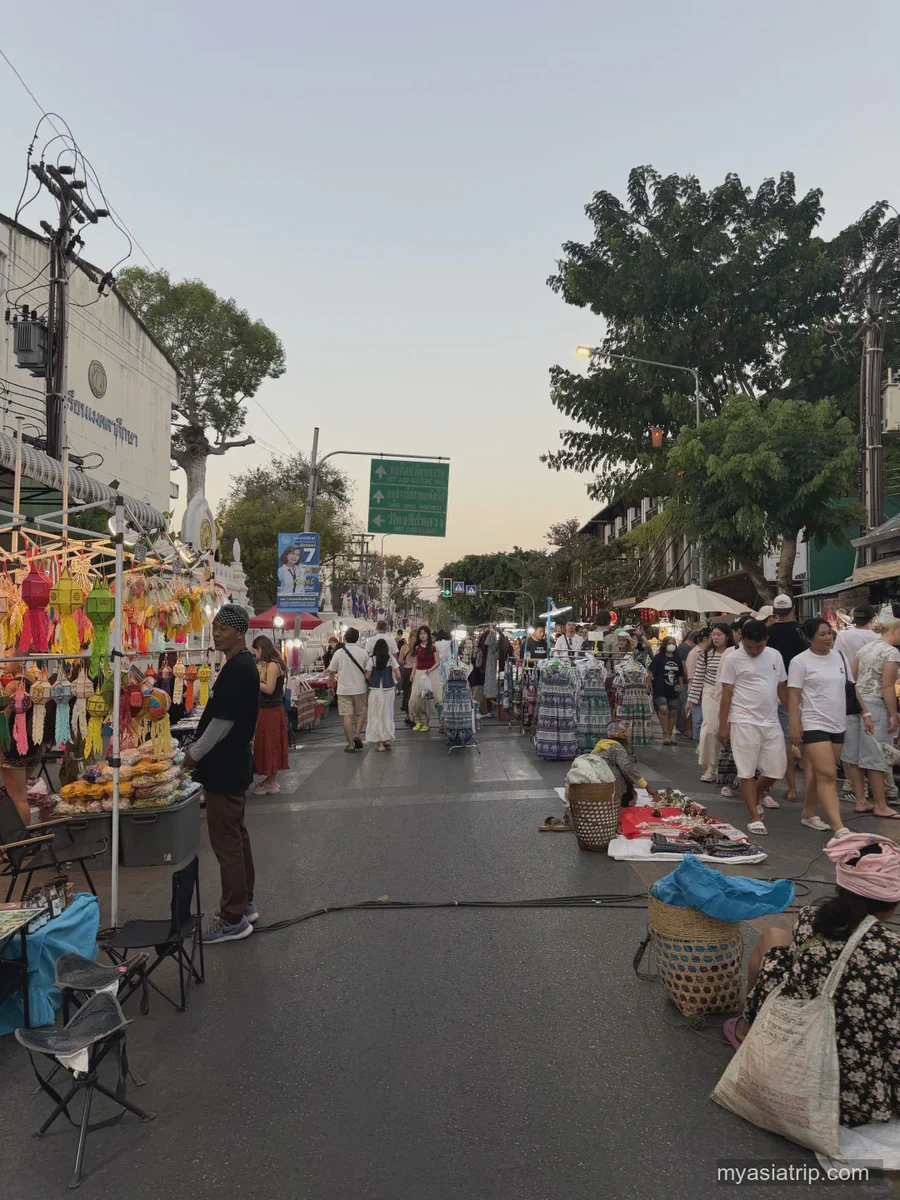 Vendors and visitors along a Chiang Mai weekend walking street