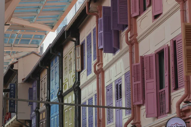 Traditional shophouses with colorful shutters in Singapore Chinatown