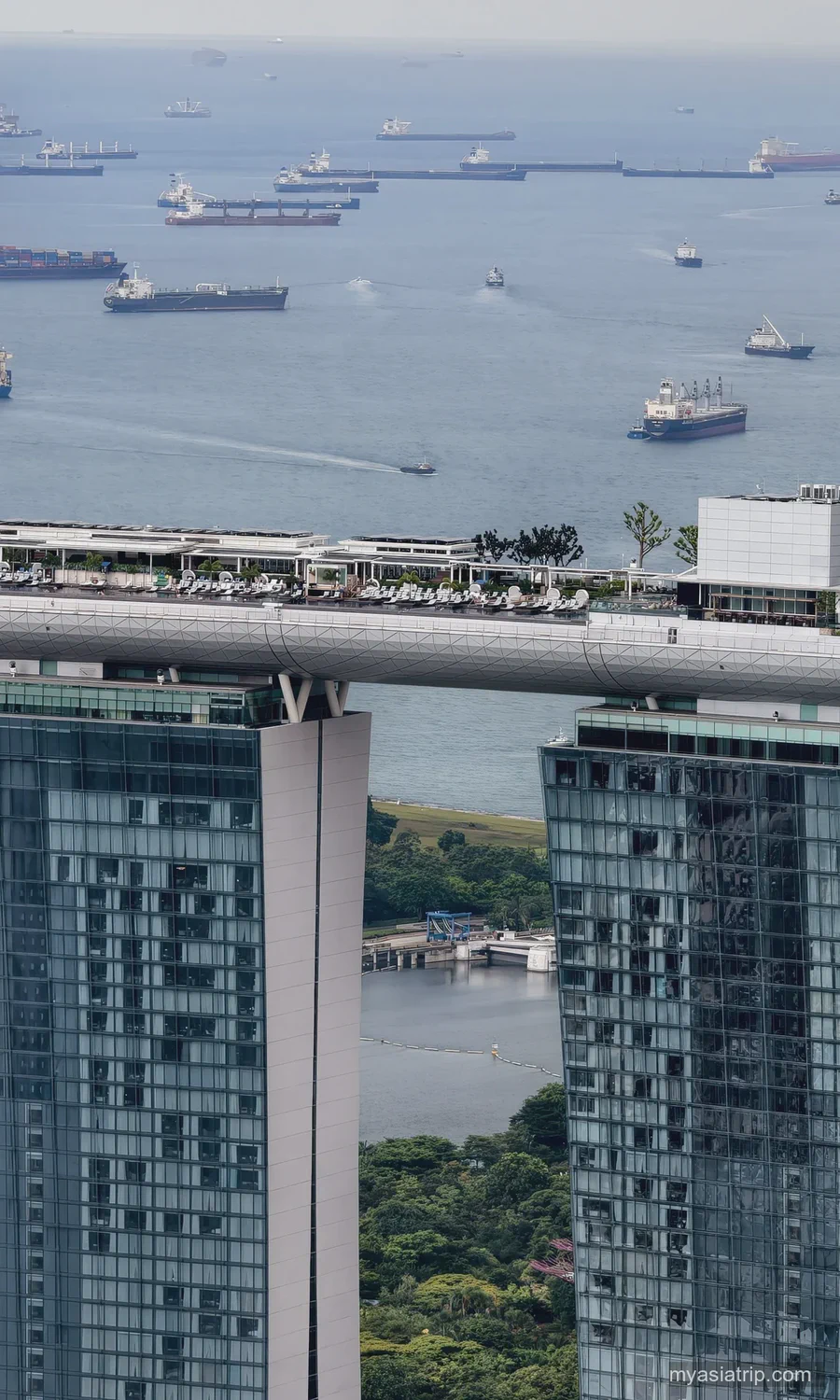 Marina Bay Sands towers rising above the waterfront district