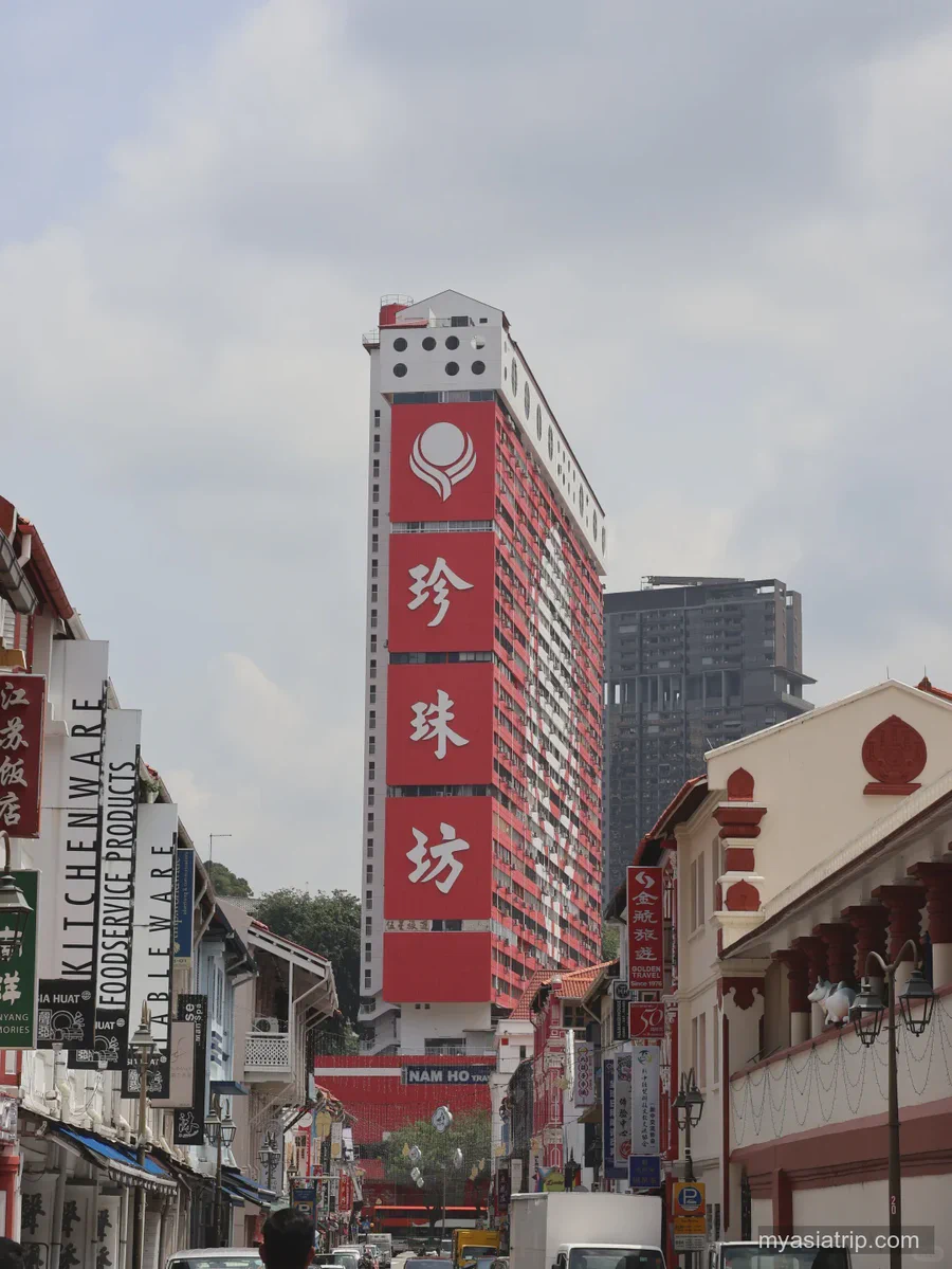 People's Park Complex rising above shophouses in Singapore Chinatown