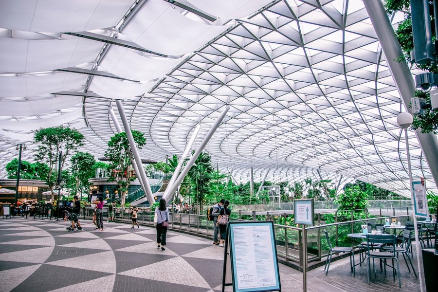 Bright interior of Jewel Changi Airport beneath its glass roof