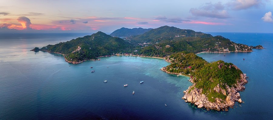 Wide aerial view of Koh Tao surrounded by blue water