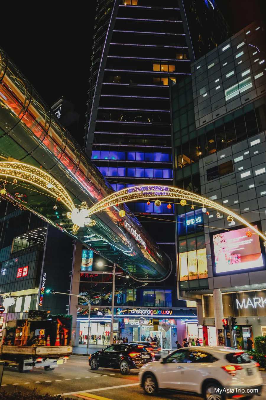 Orchard Road shopping district illuminated at night